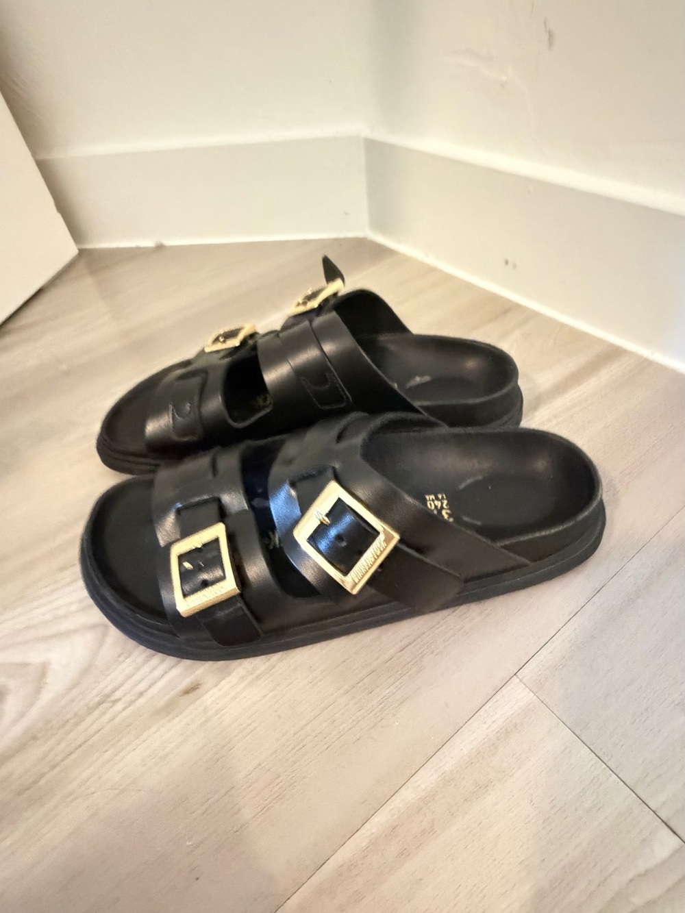 Birkenstock Black Sandals with Gold Buckles